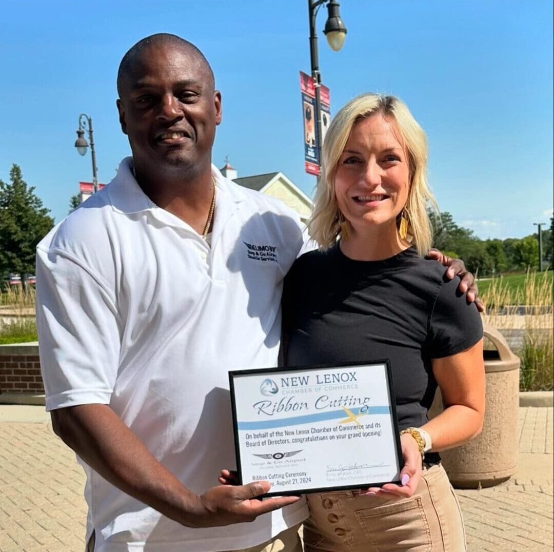 Owner Vincent with Emily Johnson at the New Lenox Chamber ribbon cutting