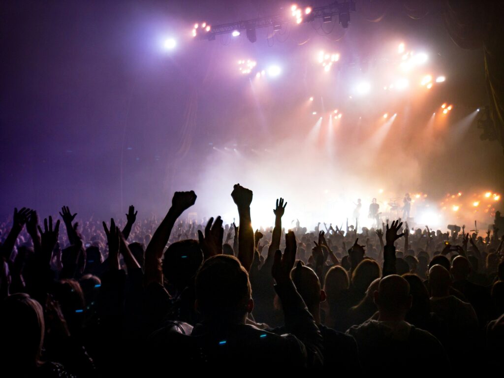 Concert crowd with stage lights at a Chicago live music venue