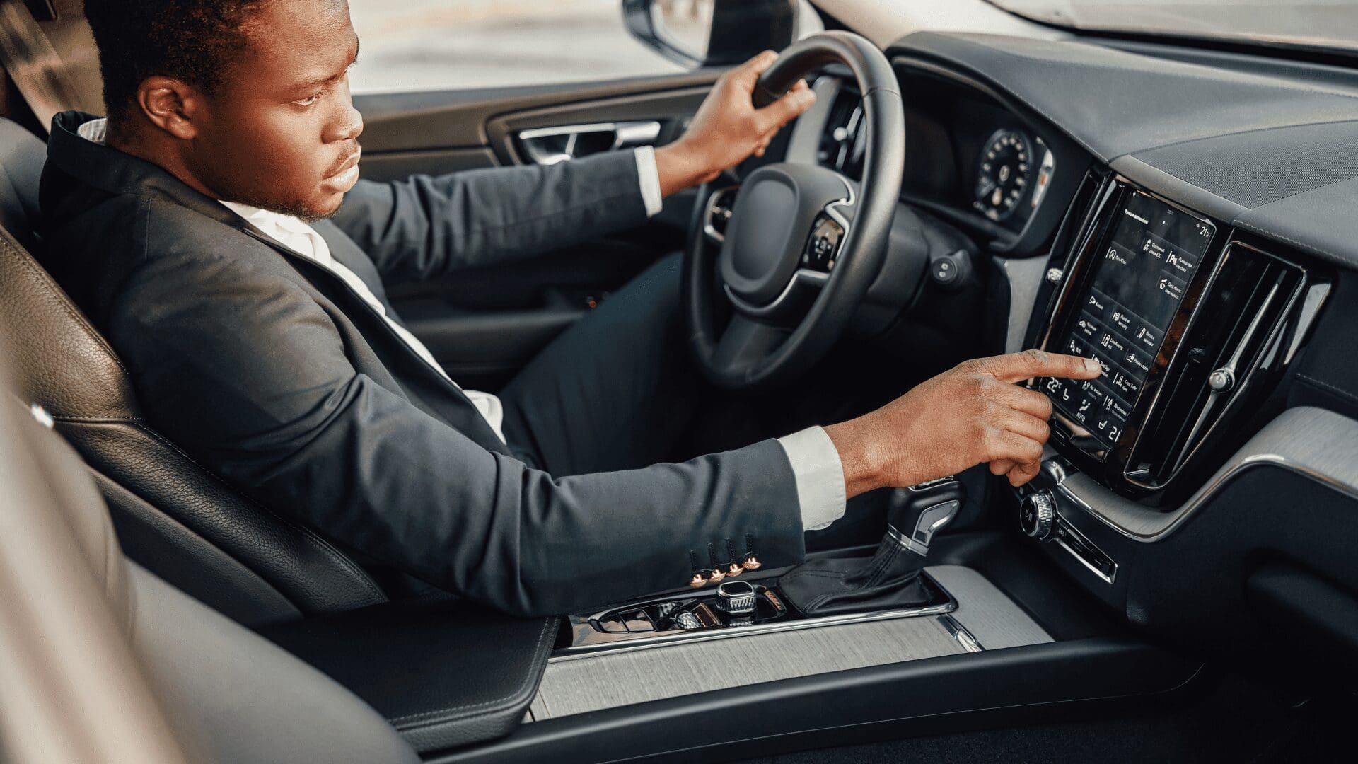 Professional chauffeur at the wheel, Stop and Go Airport Shuttle