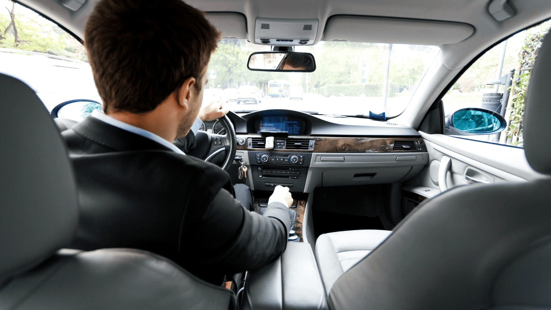 Professional Stop & Go chauffeur ready for an airport shuttle pickup in Chicagoland