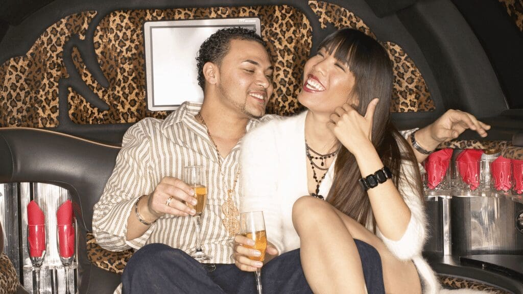 Couple enjoying a luxury limousine ride — Stop and Go Airport Shuttle, New Lenox, Illinois