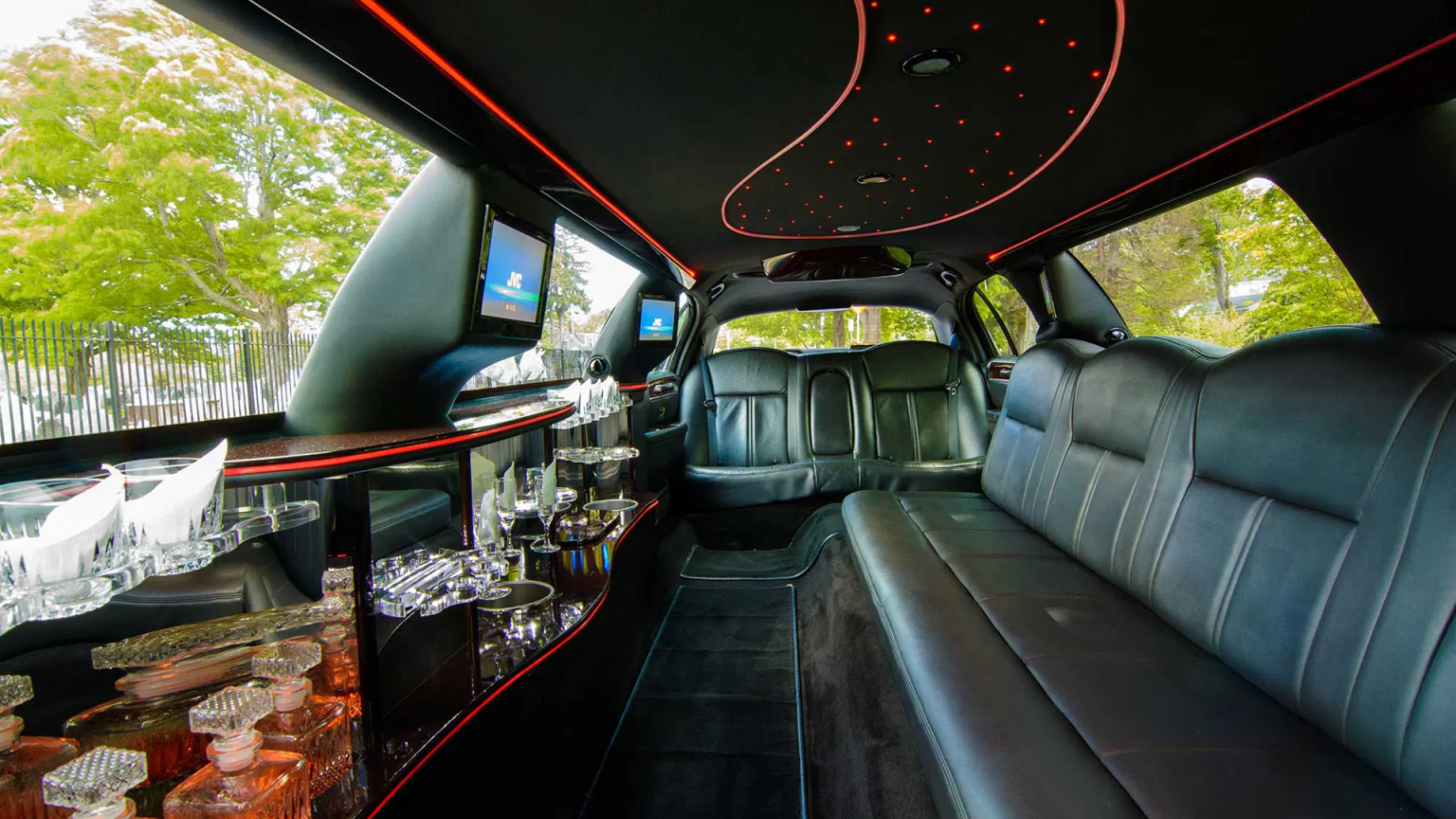 Luxurious limousine interior with premium leather seating and ambient lighting