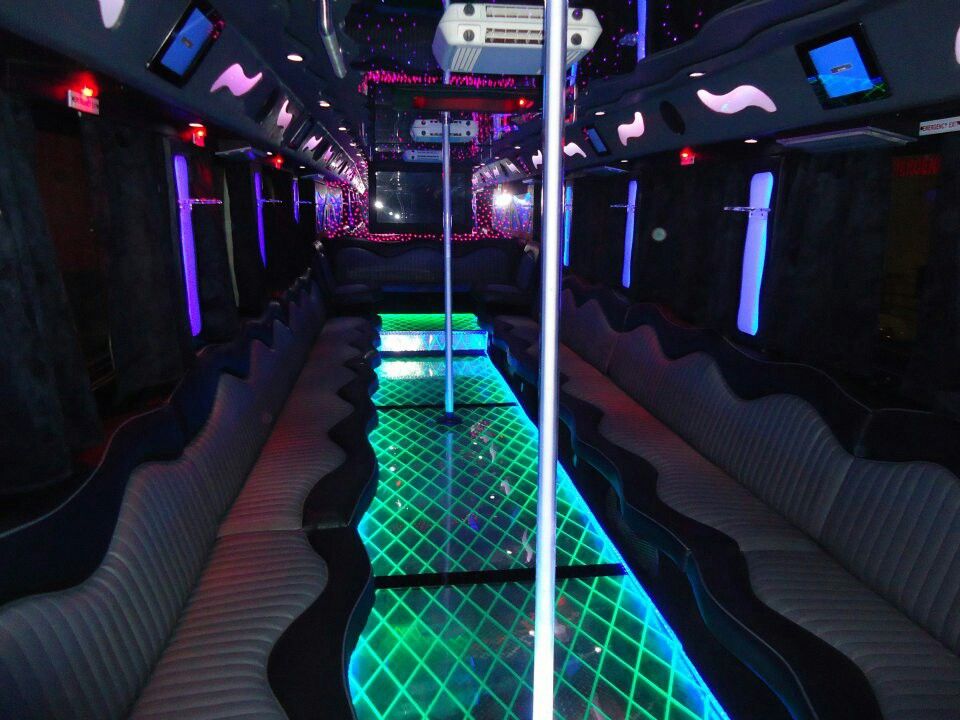 Party bus interior with LED lighting and premium seating