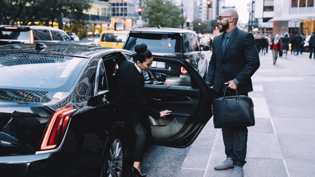 Driver greeting a client at the airport terminal