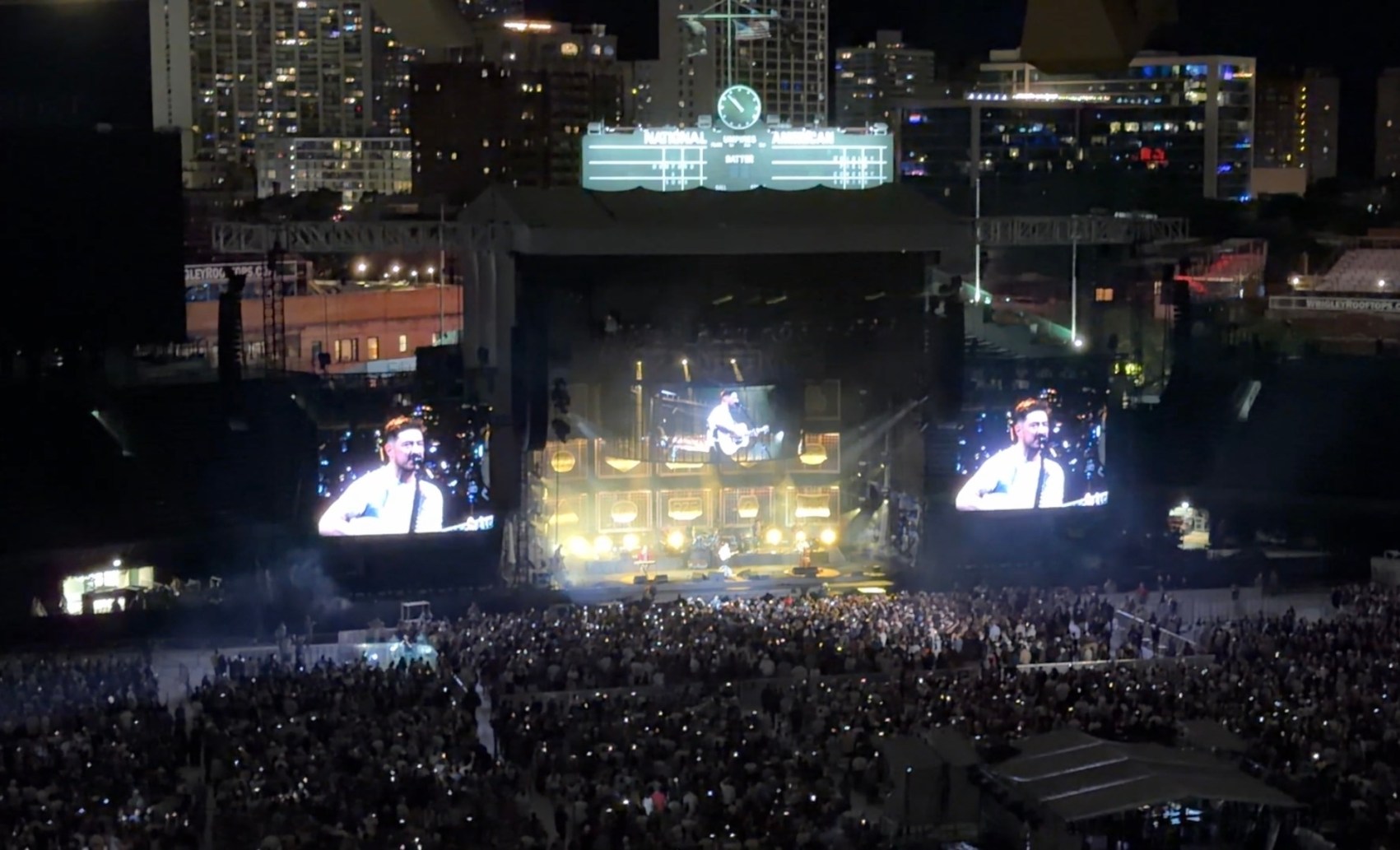 Wrigley Field exterior at night lit up for a summer concert, Chicago, Illinois