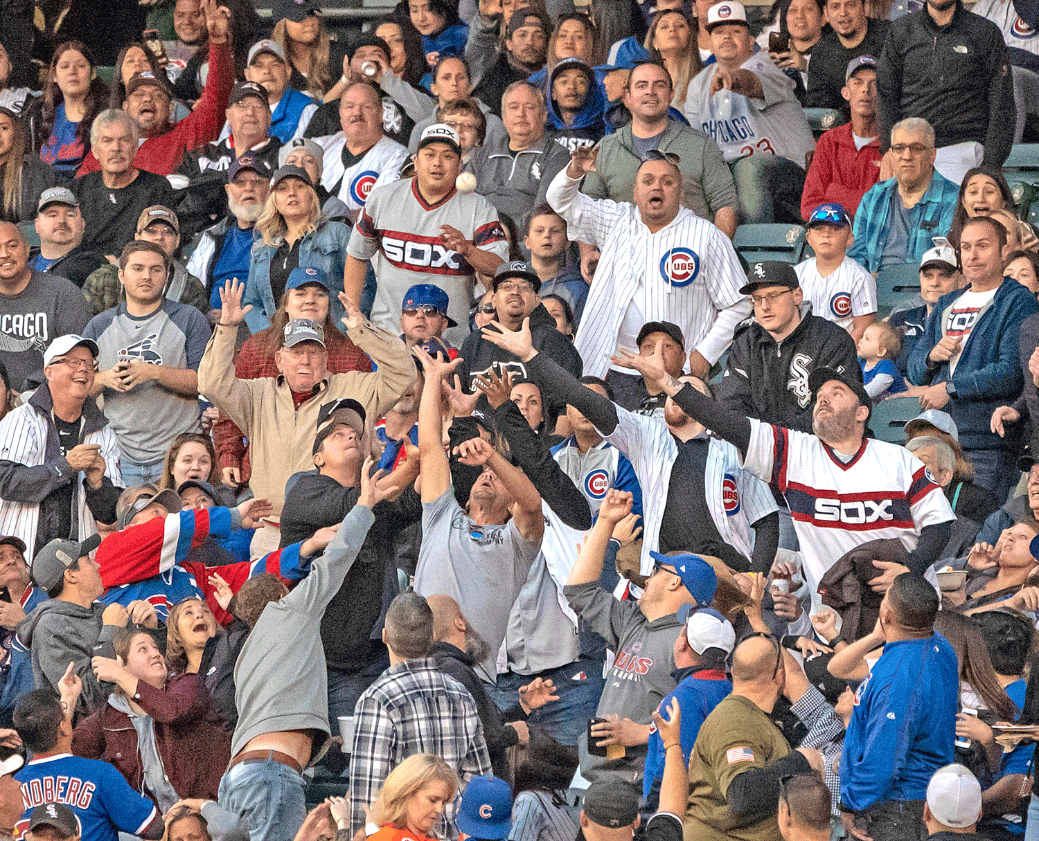 A group of baseball fans on game day in Chicago, served by Stop & Go Airport Shuttle Service, Inc. for the Crosstown Classic